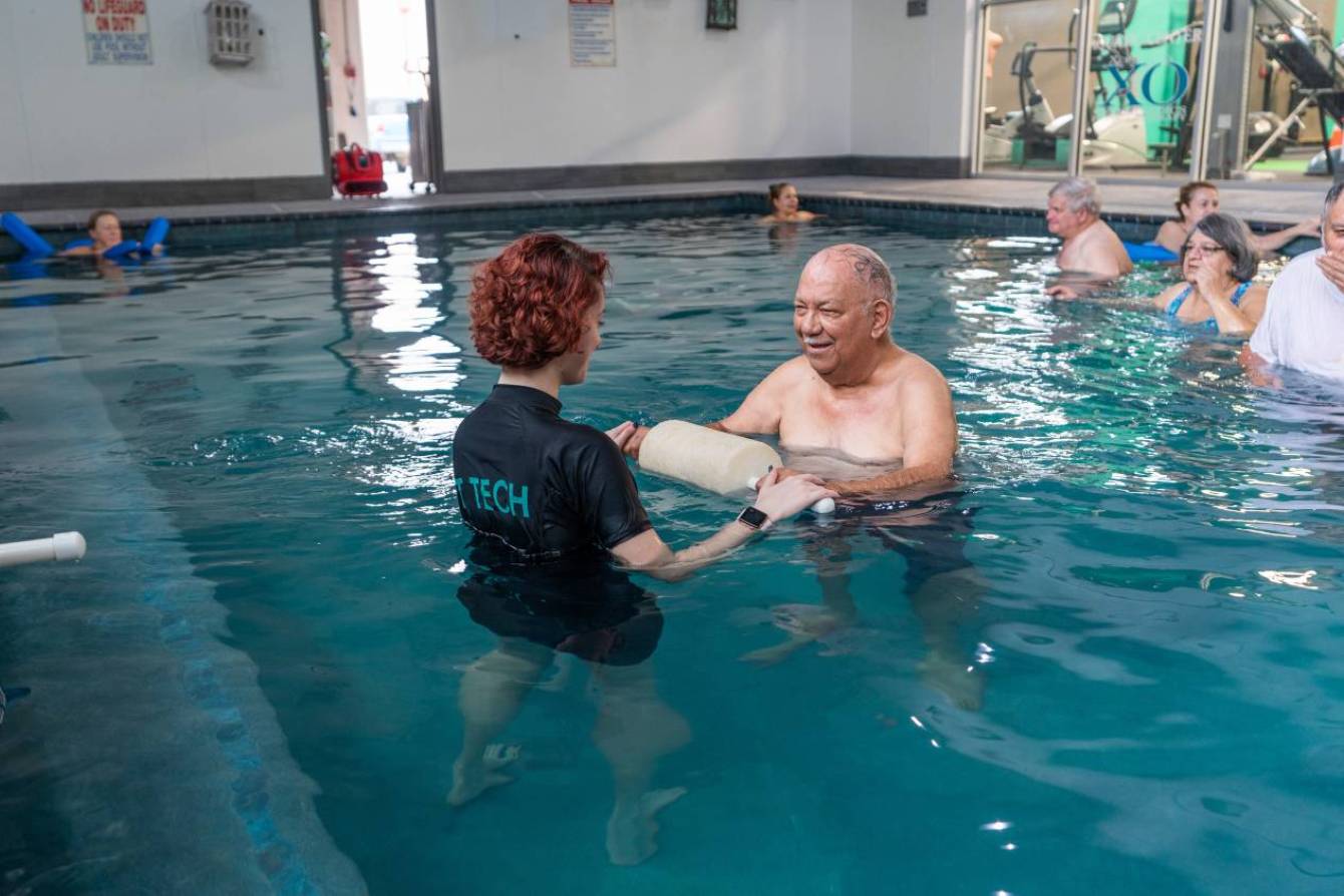 aqua therapy BC - Senior enjoying gentle water therapy for arthritis relief